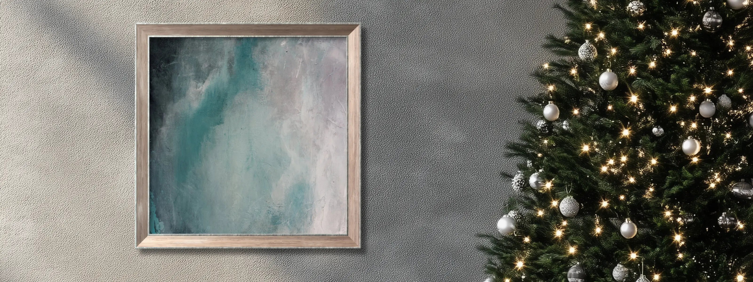 Close up on an accent wall with a square canvas wall art in blue and a chic Christmas minimalist holiday décor. 